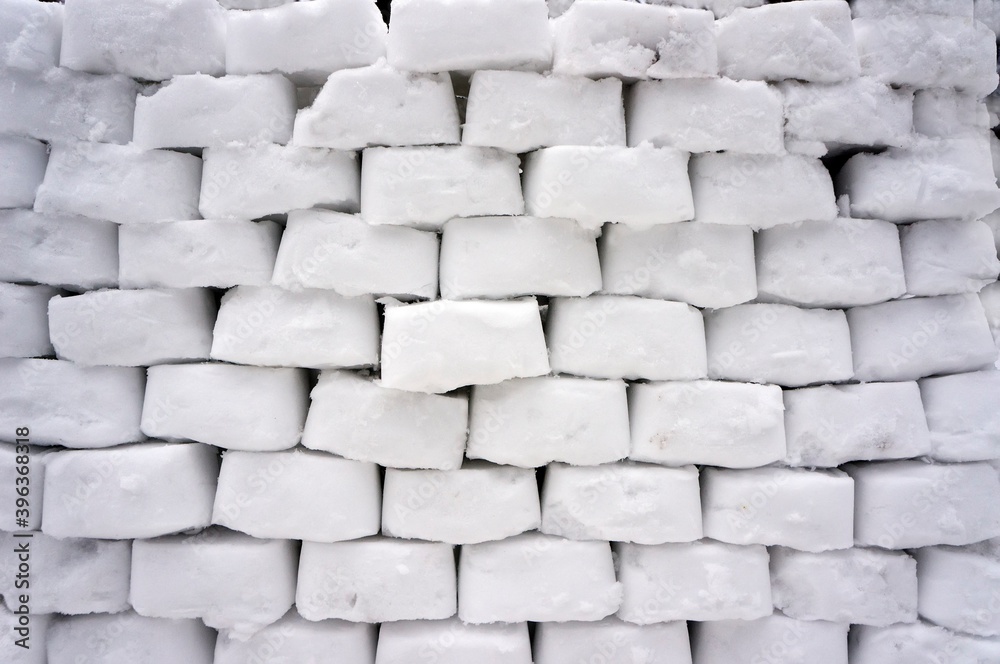 White wall of snow bricks White wall of snow bricks