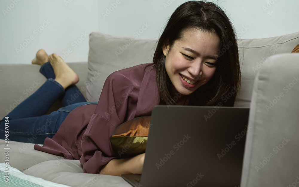 Asian woman relaxing at home Asian woman relaxing at home