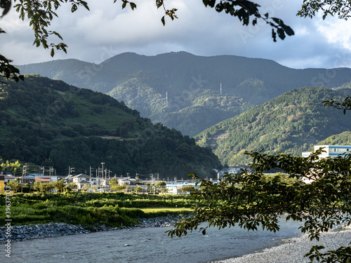 Sakawa river with mountains in the background in Matsuda, Kanagawa, Japan photo