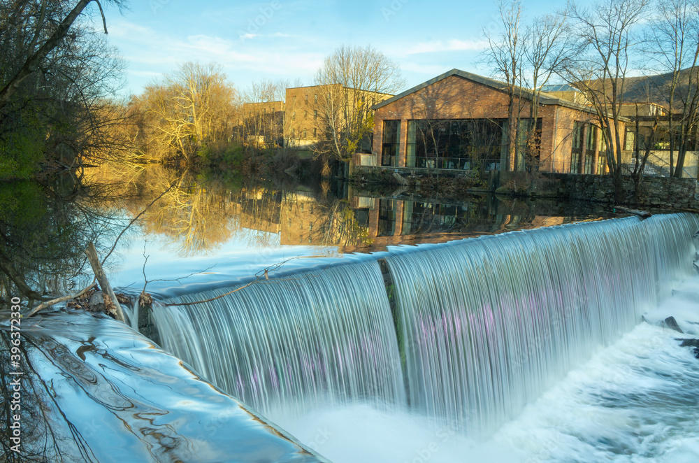 Beacon, NY - USA - Nov. 29, 2020: Landscape view of the iconic Beacon Falls on the Fishkill creek, located off of Main Street in Beacon.