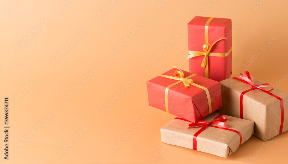 Holiday card with space for text. Lots of gift boxes with red and gold ribbons Banner Holiday card with space for text. Lots of gift boxes with red and gold ribbons Banner