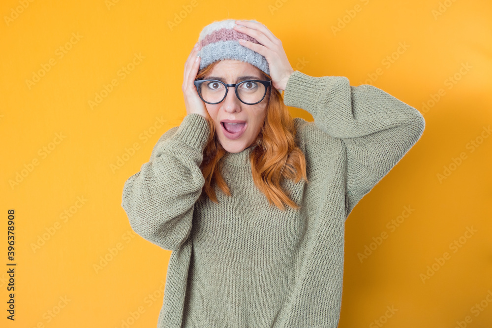 Panicking yung woman stare to you, isolated on yellow background. Mistake. Bad news. Panicking yung woman stare to you, isolated on yellow background. Mistake. Bad news.