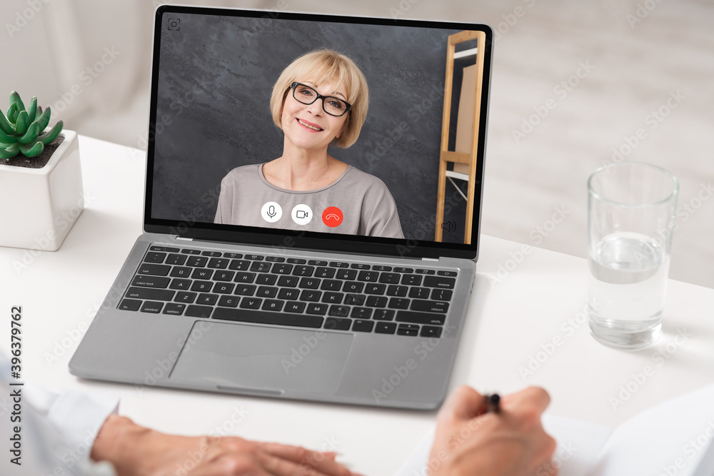 Woman Having Online Class With Teacher Sitting At Laptop Indoors Woman Having Online Class With Teacher Sitting At Laptop Indoors
