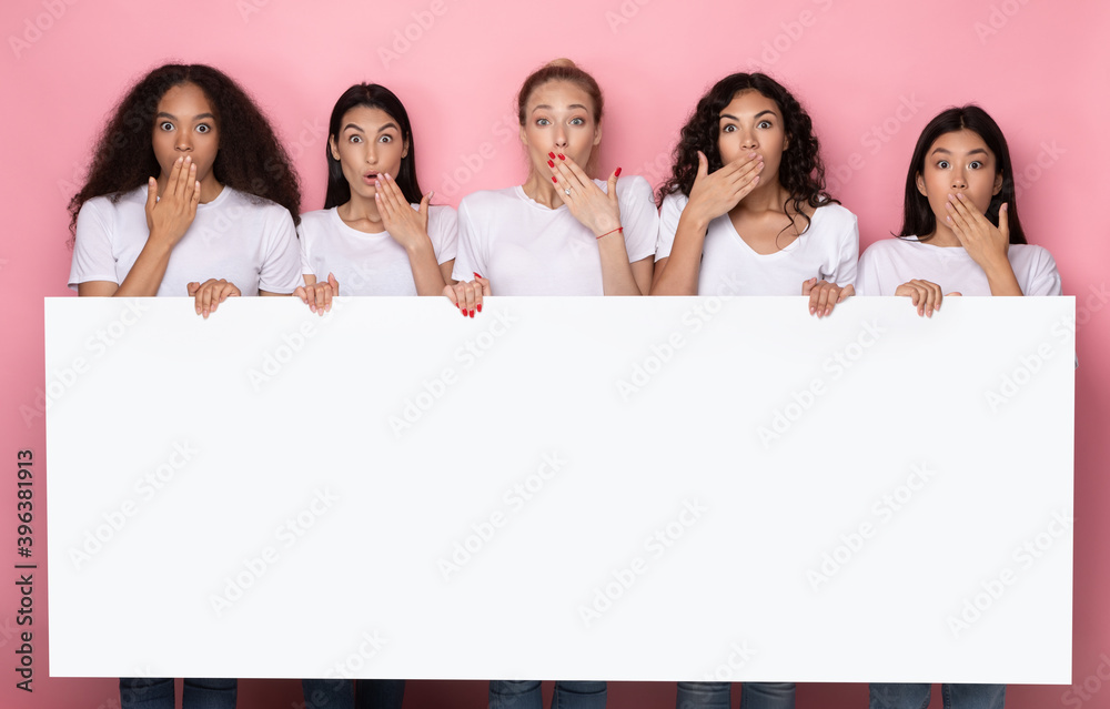 Mixed Women Holding Empty Paper Poster With Copyspace, Pink Background Mixed Women Holding Empty Paper Poster With Copyspace, Pink Background