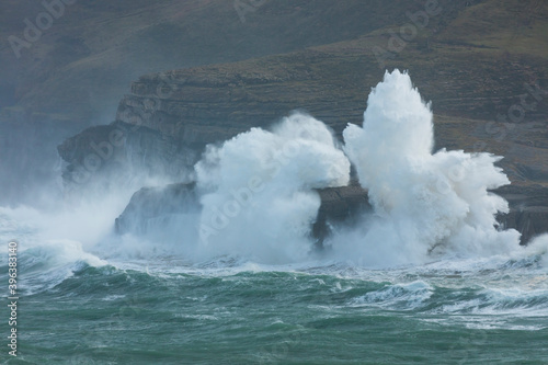 Storm and Big Waves seen from La Ojerada. Cabo Quejo. Cantabrian Sea. Arnuero. Cantabria. Spain. Europe photo