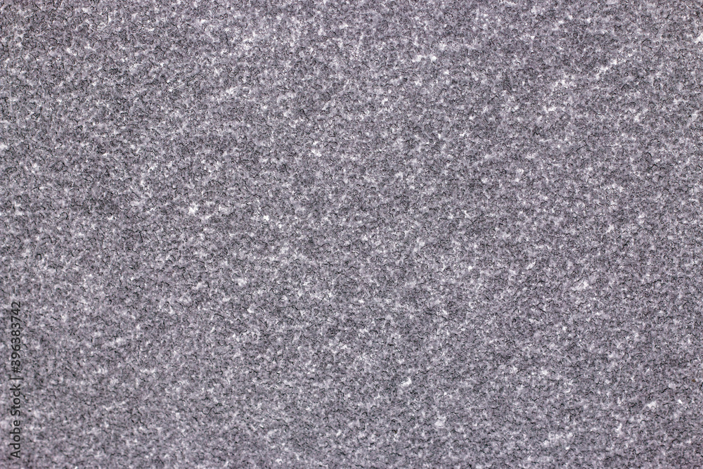 Fototapeta premium Snow pattern on frozen glass. Ice grainy background.
