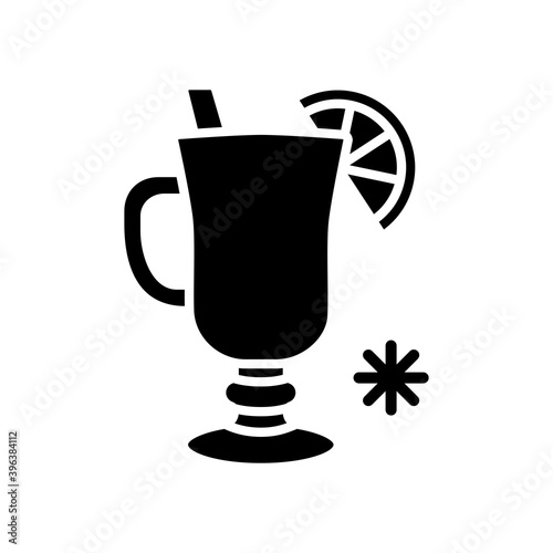 Mulled wine with orange slice and cinnamon stick