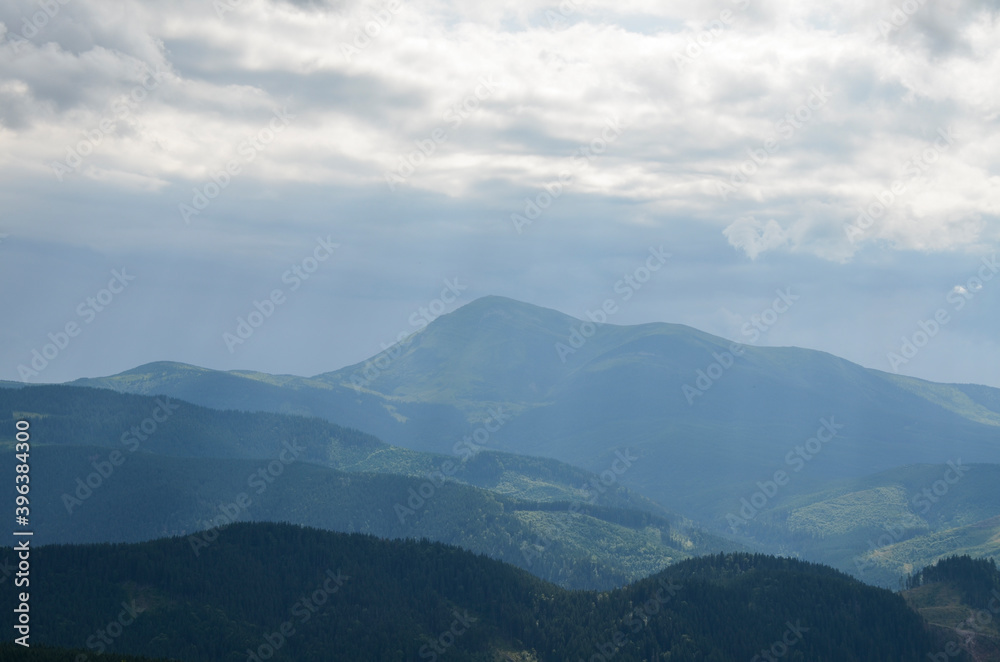 Picturesque Carpathian mountains landscape, panorama view of the Chornohora ridge with one of the highest Ukrainian mountains Petros