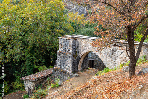 Ancient ruins of a watermill in autumn. Kalopanayiotis village, Cyprus photo