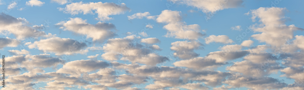 panorama of many white clouds in blue sky