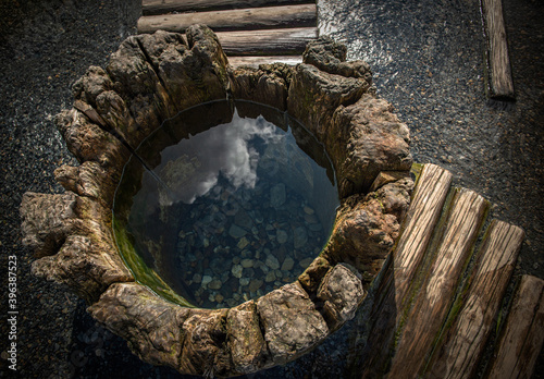 old salt well with wooden lining