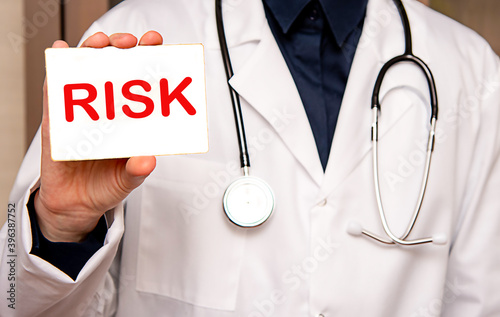 Risk sign in female physician hands, doctor warning about diseases, health care