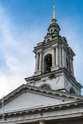 Russia, Kostroma, July 2020.Bell tower of the Orthodox cathedral with a golden spire.