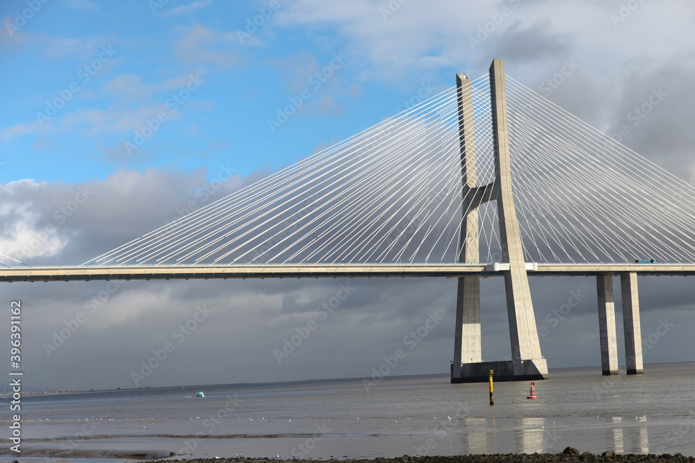 Obraz premium Impressive long white bridge in Lisbon. Portugal