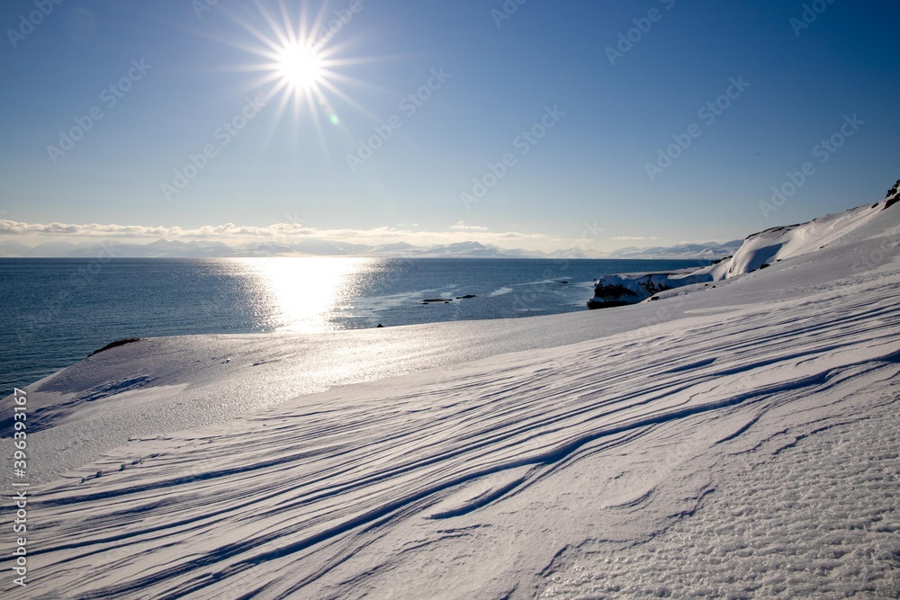 view on snowshoe tour on Spitsbergen / Svalbard during a cruise on an old sail ship early spring when the landscape was still in winter scenes with lots of snow and ice view on snowshoe tour on Spitsbergen / Svalbard during a cruise on an old sail ship early spring when the landscape was still in winter scenes with lots of snow and ice