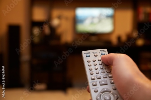Using remote control for switching TV programs from the couch