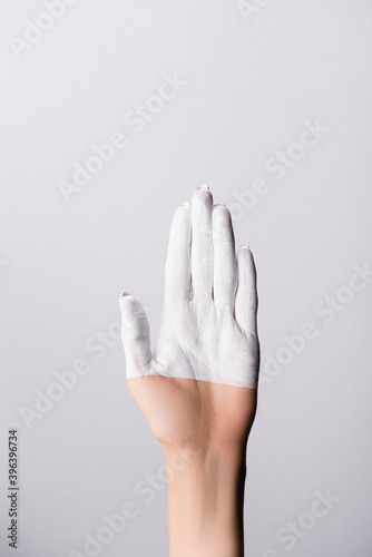 cropped view of hand with painted fingers isolated on white, stock image