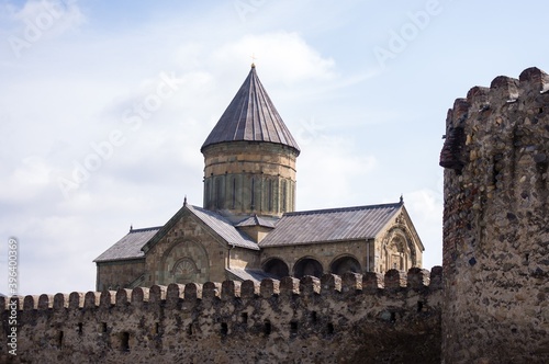 Orthodox Cathedral with walls around in Mtskheta, Georgia photo