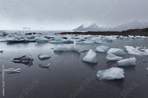 Glacial lake in Jokulsarlon with floating icebergs