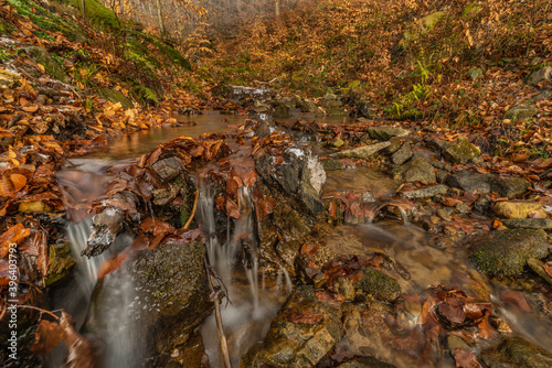 Waterfall under Cernava in east Moravia region in autumn winter cold day photo