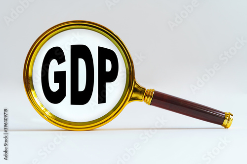 Magnifier on a white background, inside the text is written - GDP