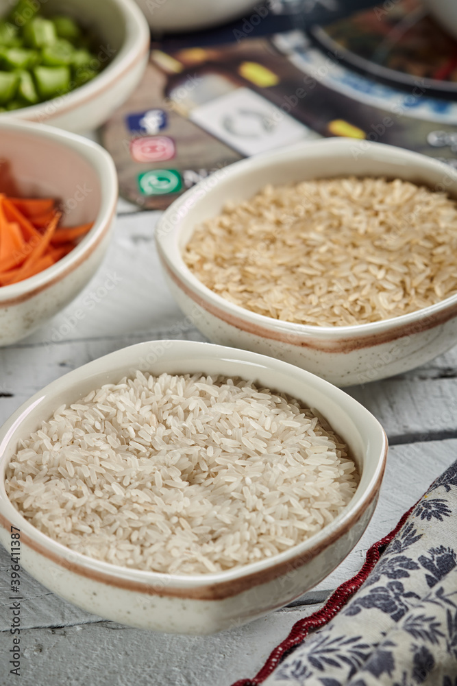 Grains of rice for making paella in a bowl Grains of rice for making paella in a bowl