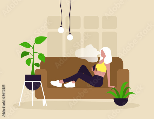 Vape. Young woman smoking a vape in light room. Lifestyle.