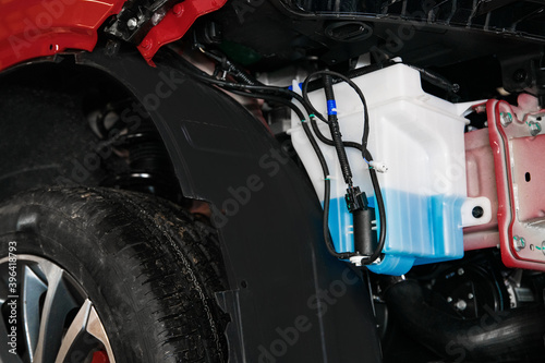 Wallpaper Mural tank with washer fluid and a motor in the car body Torontodigital.ca