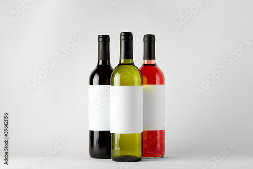 Mockup. Bottles of wine of different types isolated on a white background.
