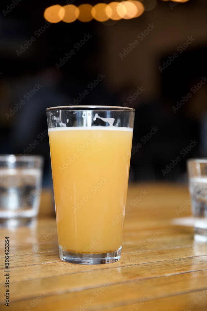 Delicious trendy beer on bar counter - close up Delicious trendy beer on bar counter - close up