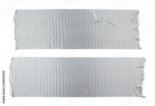 Fototapete Two stripes of silver grey adhesive tape on white background