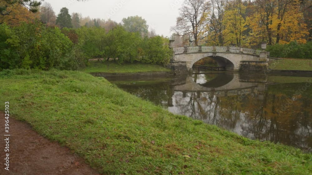 Pavlovsk park in autumn, St. Petersburg, Visconti bridge spanning the Slavianka river