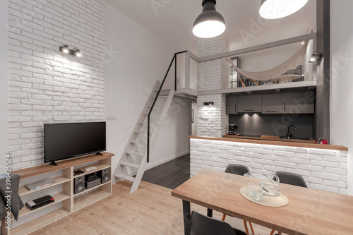 Modern apartment with mezzanine photo