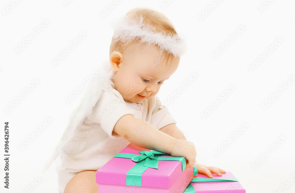 Portrait of cute baby playing with toys over a white background Portrait of cute baby playing with toys over a white background