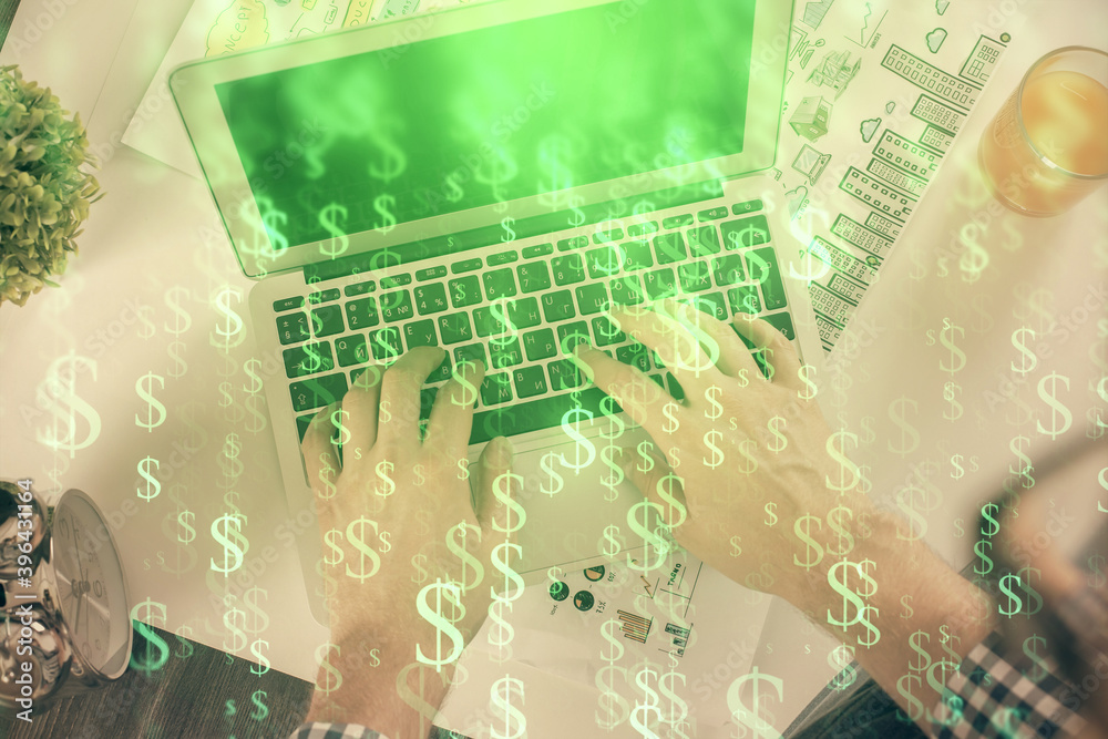 Double exposure of man's hands typing over laptop keyboard and forex chart hologram drawing. Top view. Financial markets concept. Double exposure of man's hands typing over laptop keyboard and forex chart hologram drawing. Top view. Financial markets concept.