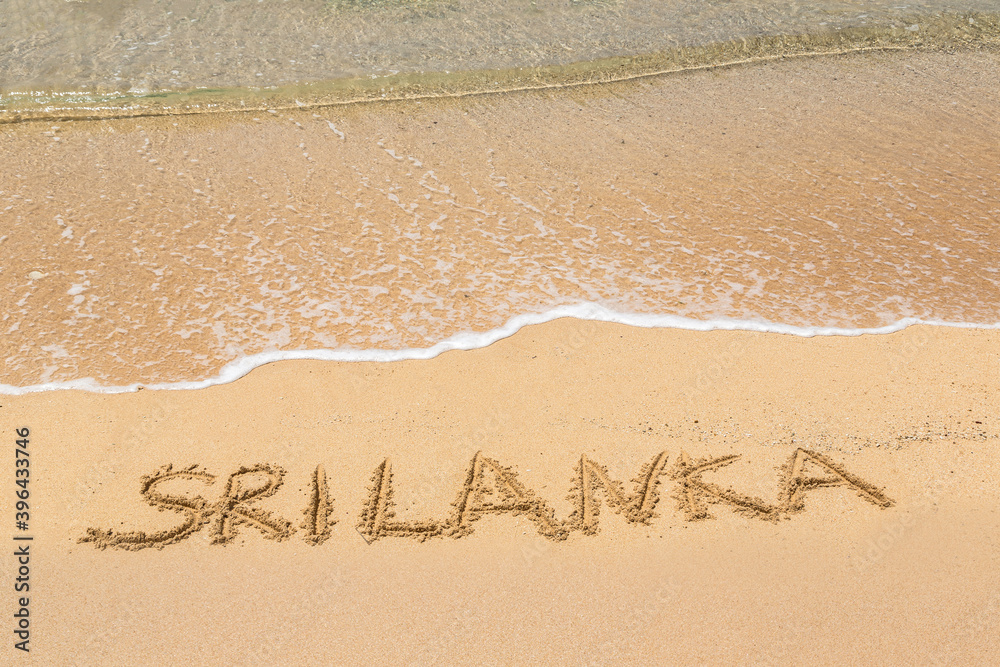 Fototapeta premium Sri Lanka written in a sandy