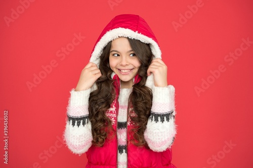 Dreams come true. cold season activity style. childhood happiness. thermal clothing. happy teen girl wear warm clothes. winter kid fashion. child with long curly hair in christmas aparrel photo