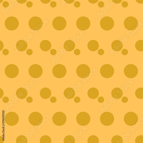 Fortuna gold geometric pattern of small and large circles and bubbles. Fortuna gold circles on pastel yellow background