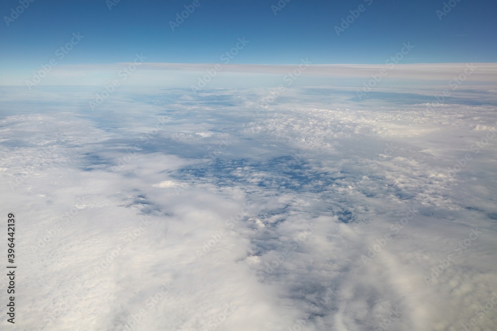 Clouds seen from above on a plane flight Clouds seen from above on a plane flight