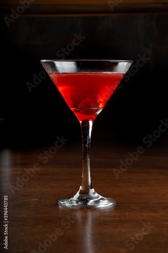 cosmopolitan cocktail in black background