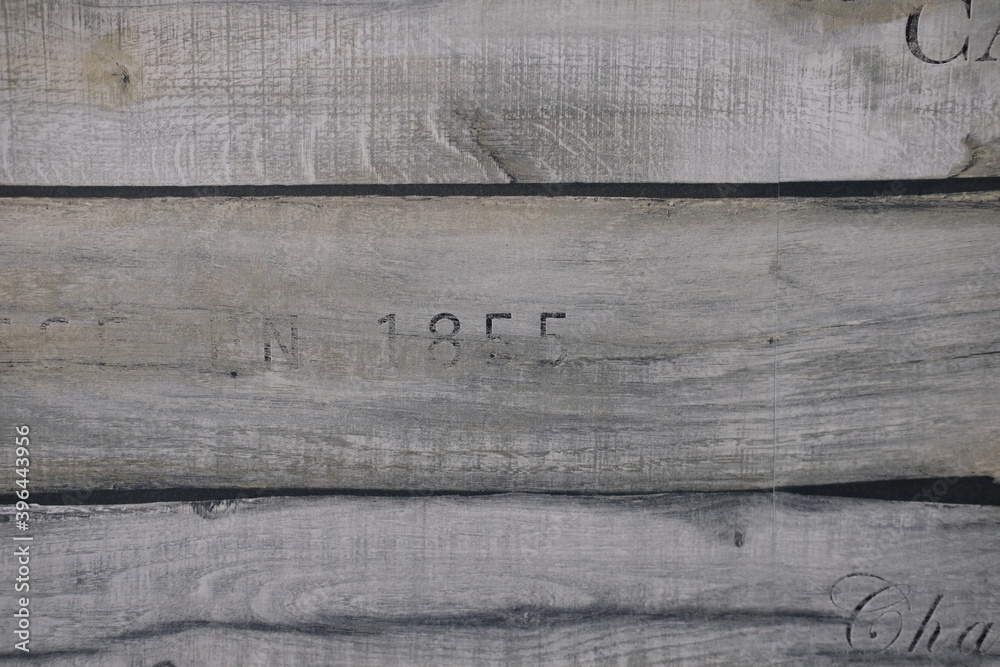 wooden texture of three planks with number 1855 embrassed on it wooden texture of three planks with number 1855 embrassed on it