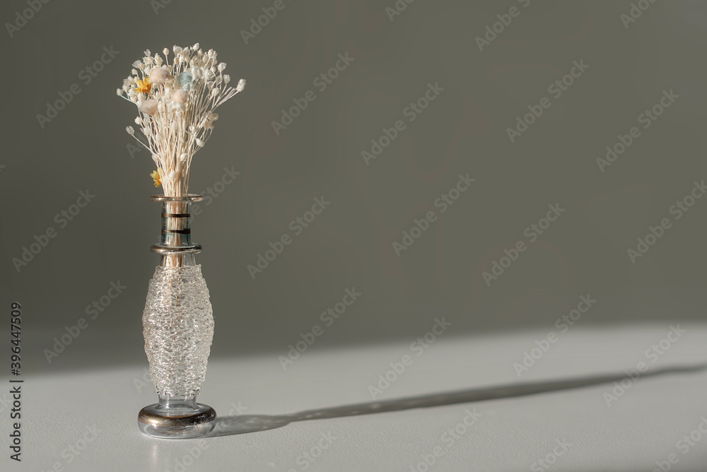 Small vase with dried flowers