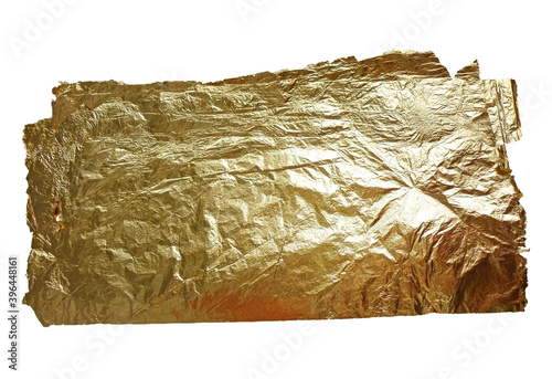 Gold foil isolated banner on white background. Gold potal foil texture. Foil leaf. Gold foil sheet. photo