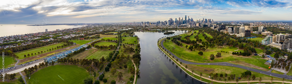 Panoramic view of the beautiful city of Melbourne as captured from above Albert Park Lake late in the afternoon