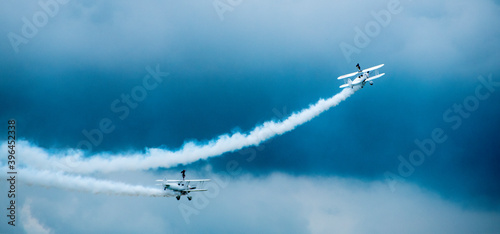 civil jets maneuvering in the sky during an air parade