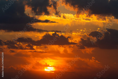 Tableau sur toile Multiple layers of clouds during sunset time