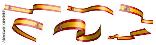 Set of holiday ribbons. Spain flag waving in wind. Separation into lower and upper layers. Design element. Vector on white background