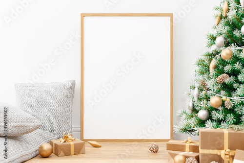 Photoframe mockup with christmas tree and decoration.