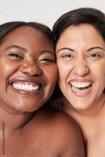 Women laughing body positivity studio shoot