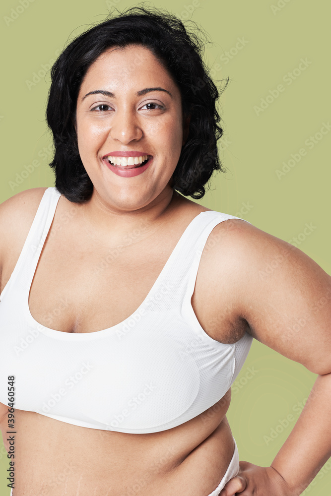 Attractive curvy woman sportswear apparel studio shot